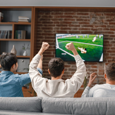 Friends cheering on a soccer game