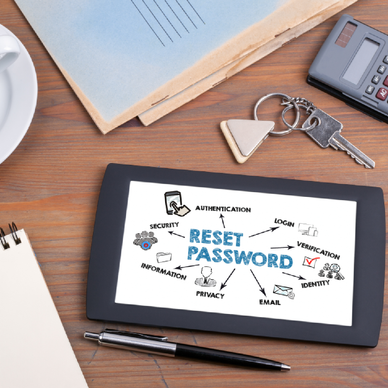 Reset Password. Text on tablet device on a wooden table