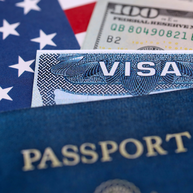 A picture of a visa and passport overtop American flag and dollar bill