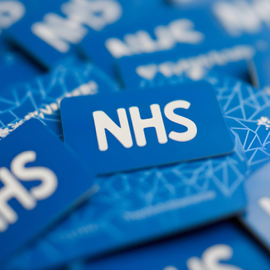 National Health Service logo on blue background