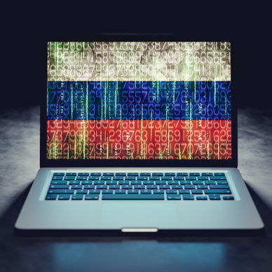 Hacked laptop screen with Russian flag.