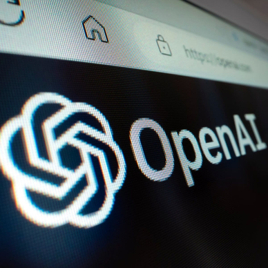 Close-up view of OpenAI logo on its website.