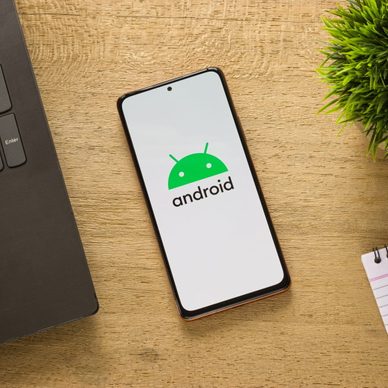 Android logo on phone screen.