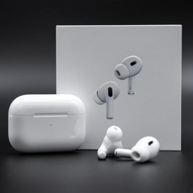 Apple AirPods Pro 2nd generation next to charging case and packaging box on black background.