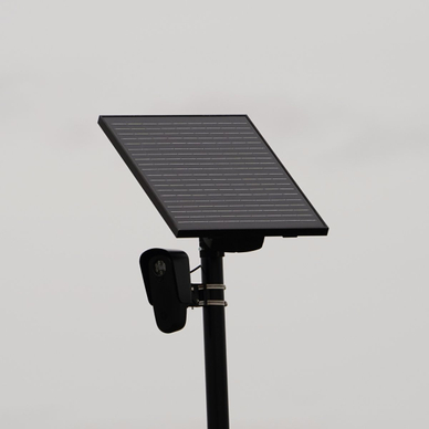 Flock safety police law enforcement license plate reader set up outside to help catch vehicle speeders.