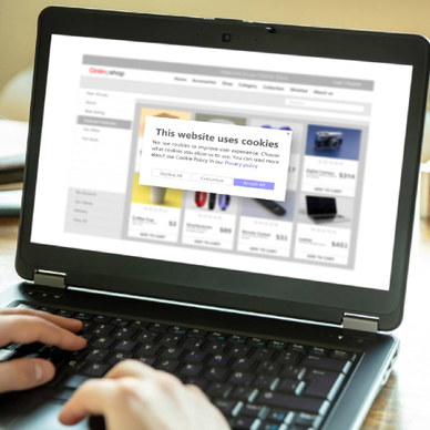 Person shopping online when a cookie pop up prompts to accept cookies to enhance user experience