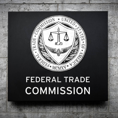 Closeup of the FTC logo on a building