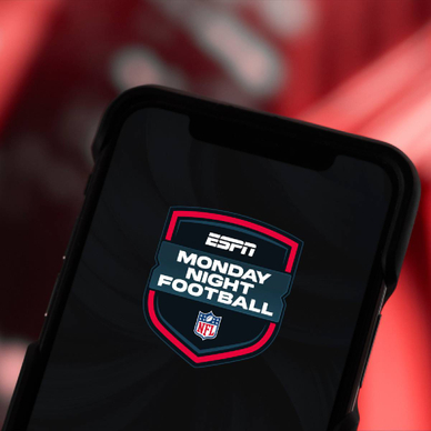Closeup of a smartphone screen displaying ESPN Monday Night Football logo