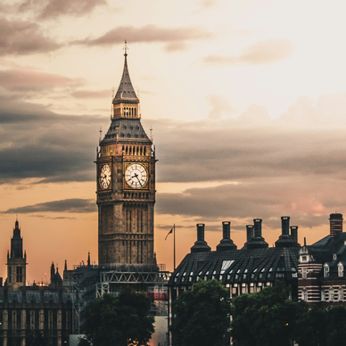 Moody picture of UK parliament at sunset.