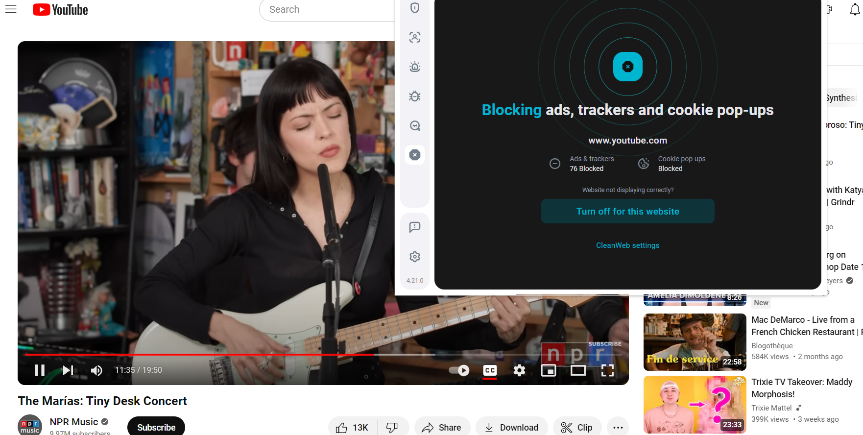 A YouTube video with the Surfshark extension in the foreground