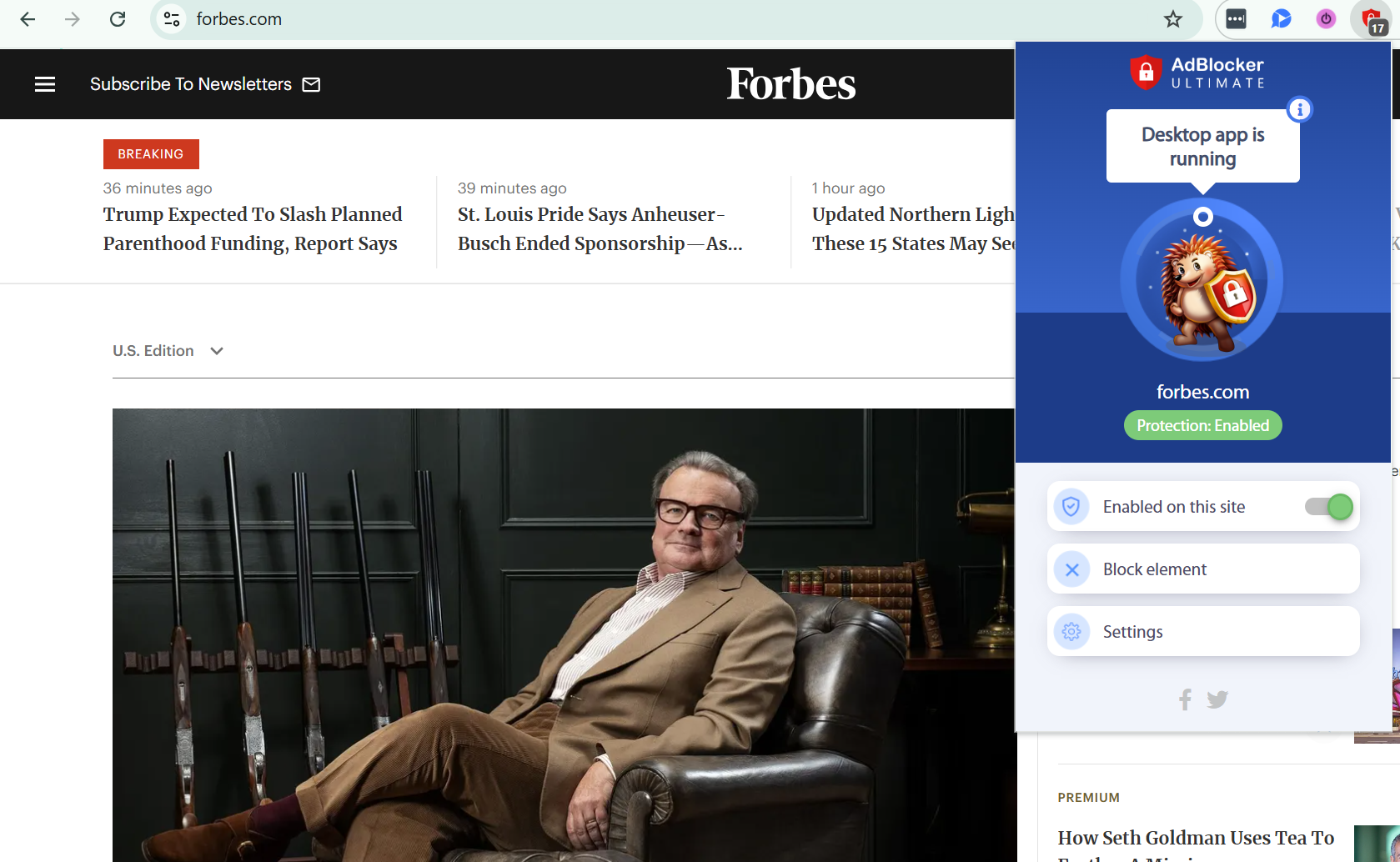 Forbes homepage with AdBlocker Ultimate extension open