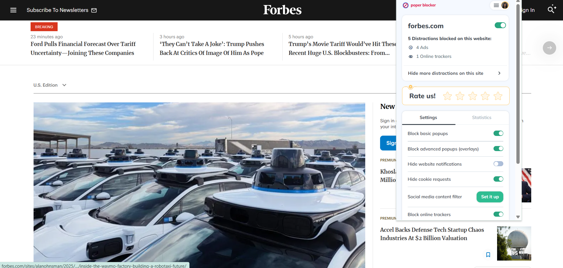 Forbes homepage with Poper Blocker extension open in the foreground 