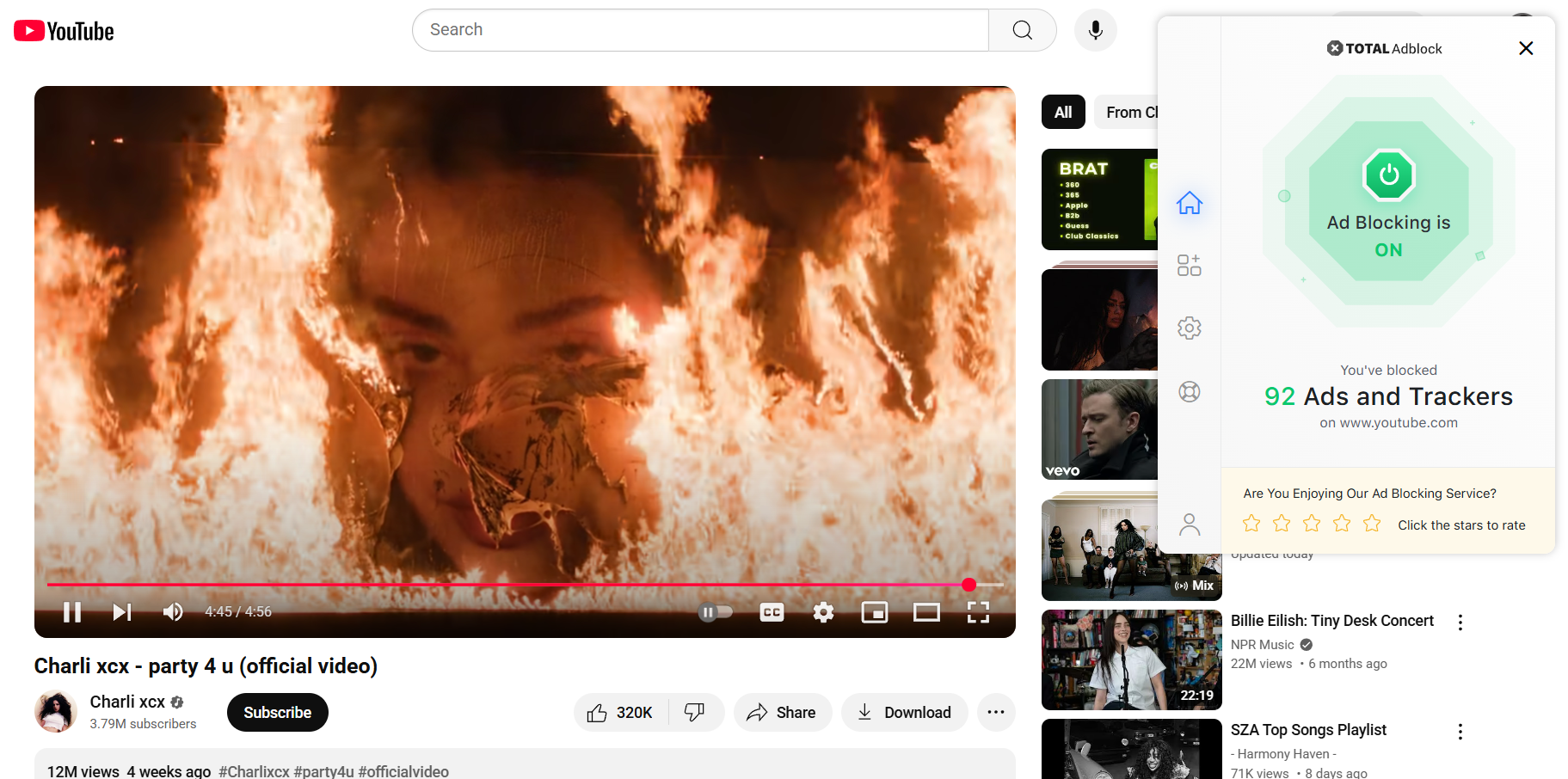 A YouTube video with Total Adblock extension open (92 ads and trackers blocked)