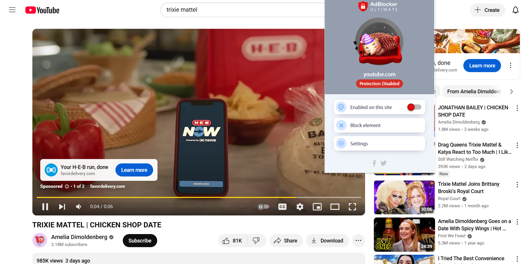 A YouTube video playing a pre-roll ad with the Adblocker Ultimate extension in the foreground (paused)