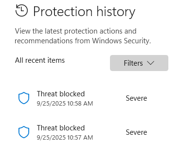 Microsoft Defender protection history (two EICAR files blocked)