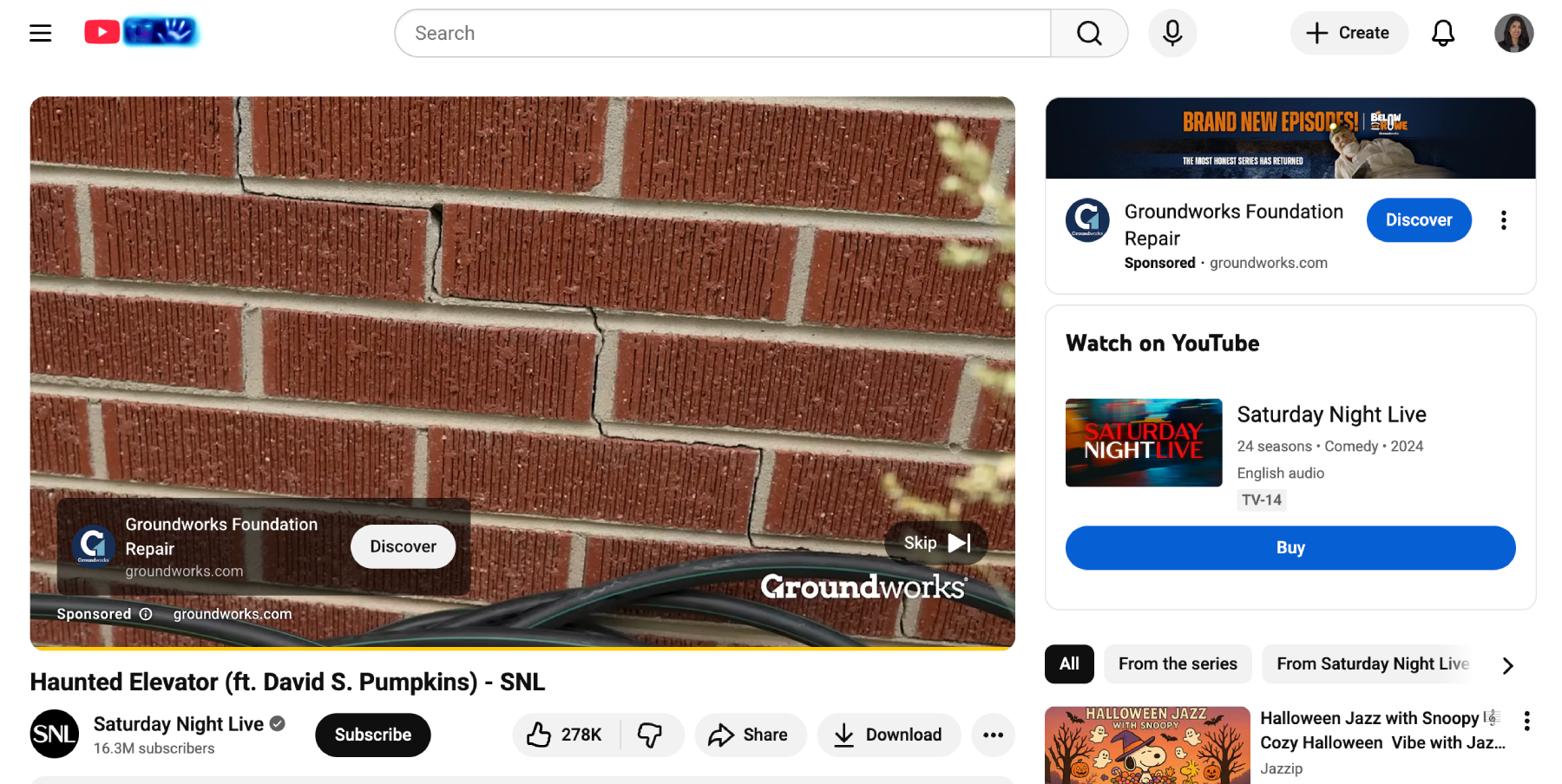 A YouTube video playing a pre-roll ad.