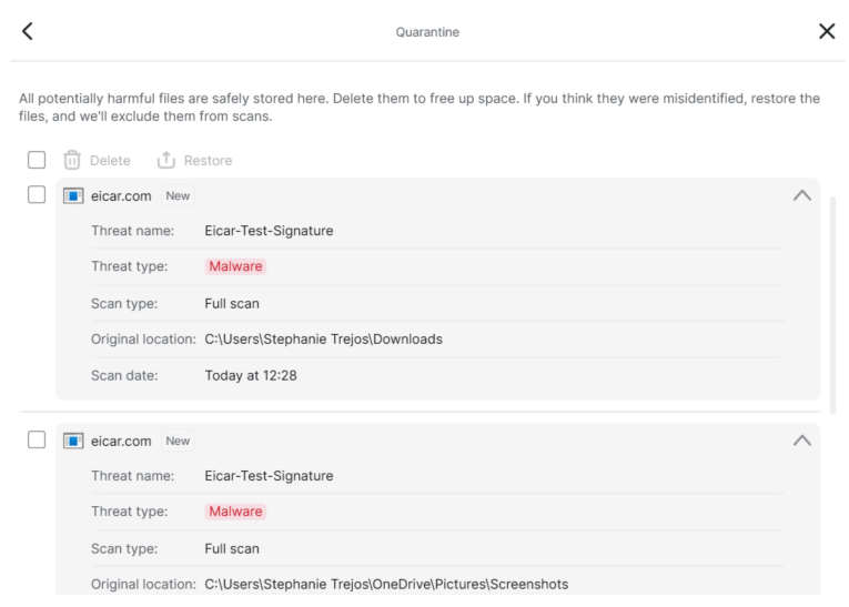 Surfshark Antivirus quarantine tab showing EICAR files found in downloads and screenshots folder