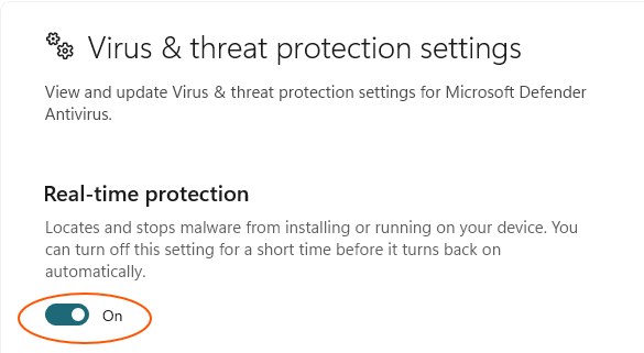 Windows Security settings showing Real-time protection enabled, with the toggle highlighted